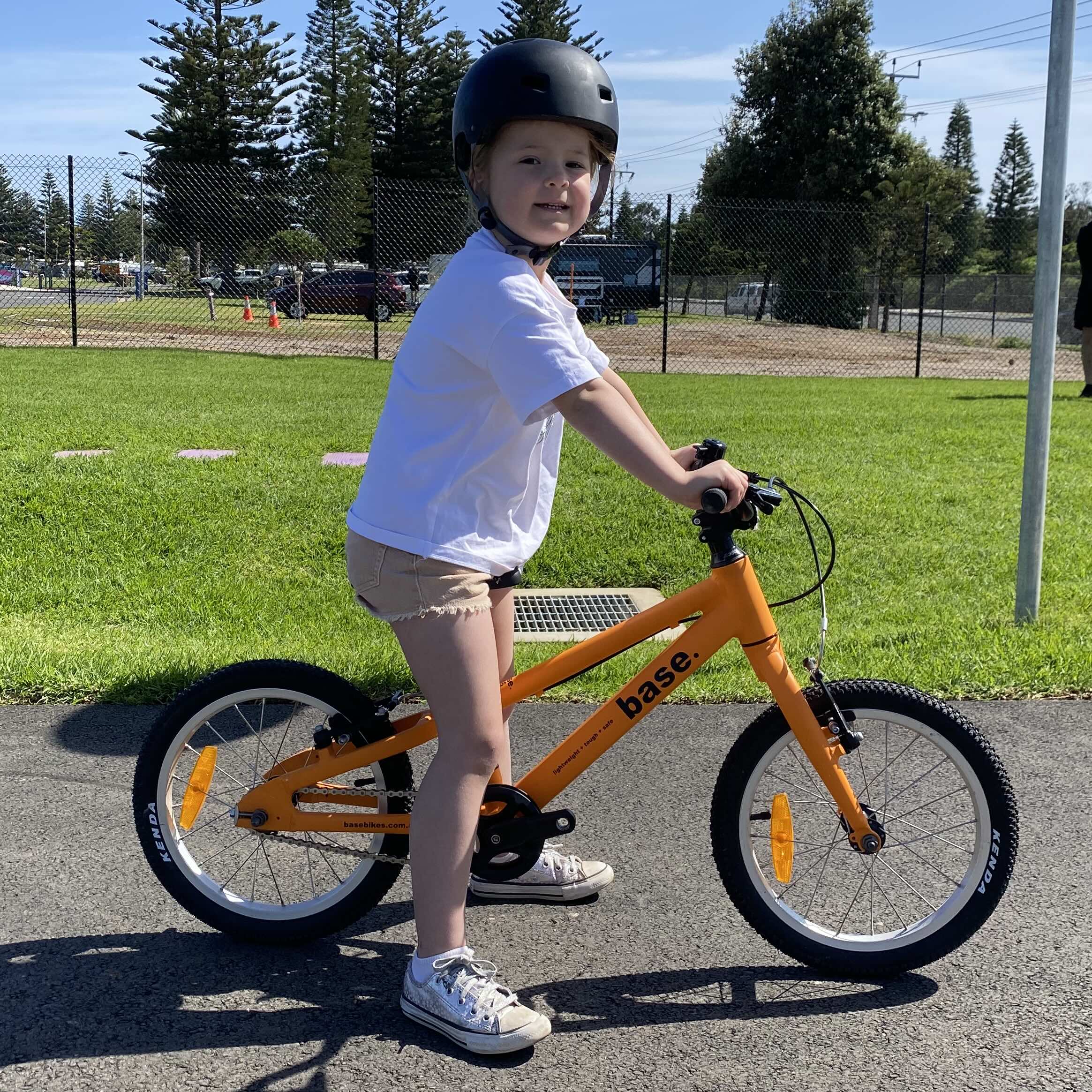 Child on bike without pedals