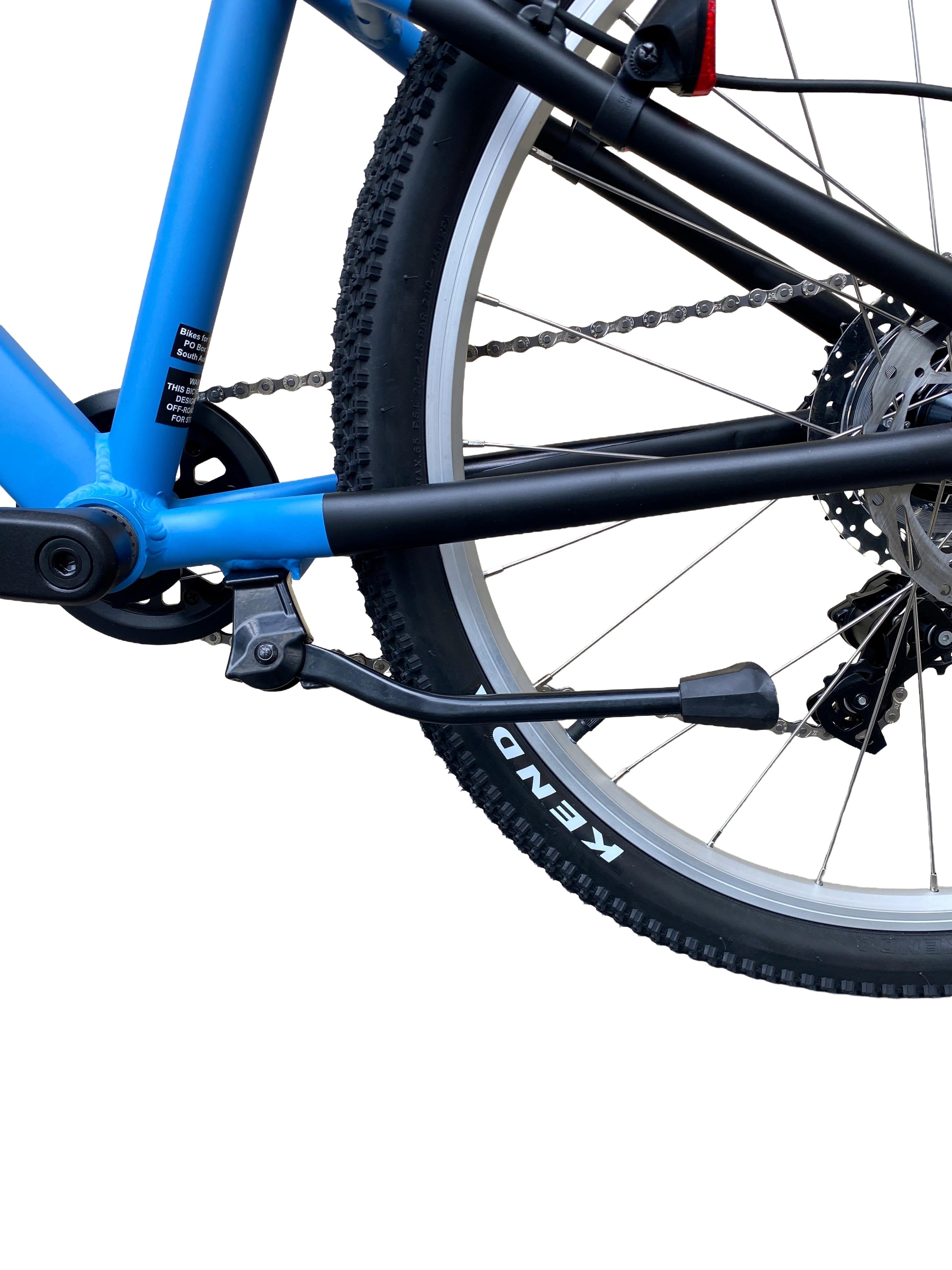 Black centre-mount kickstand folded up on the base 24 inch kids bike
