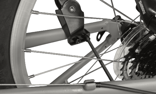 Close-up of a bicycle showing kickstand installation on a white background