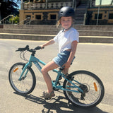 7 year old girl on a 20 inch bike