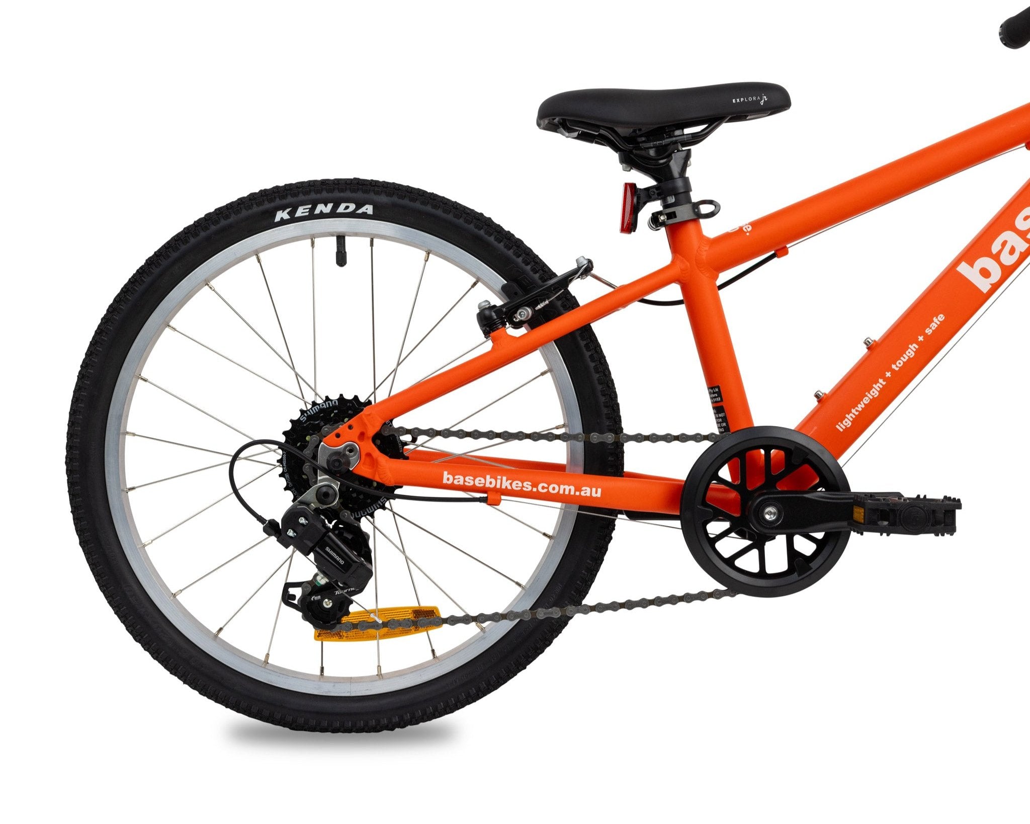 Red base girls 20 inch kids bike zoomed in on rear of bike to show Shimano gears, with white background