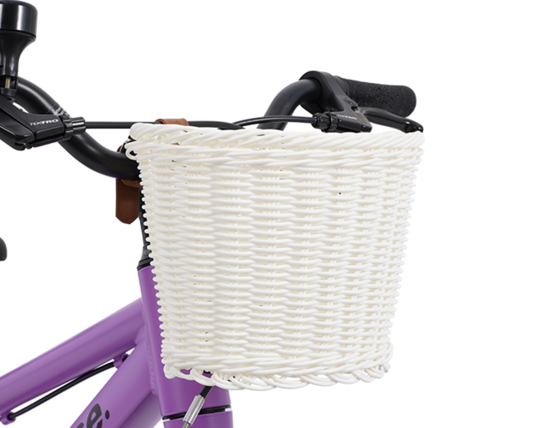 White kids bike basket diagonal view on a purple bike