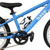 Close-up of a blue children's bicycle frame with black components, a white water bottle, and visible 'base.' branding on the downtube against a white background.