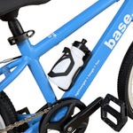 Close-up of a blue bicycle frame with a white and black base water bottle mounted on the down tube, alongside black pedals and chainring.