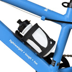 Close-up of a white water bottle with a black cap mounted in a black frame-mounted bottle holder on a blue bicycle frame.
